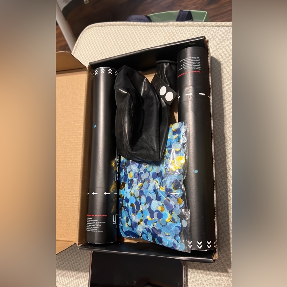 smoke bomb and confetti balloon